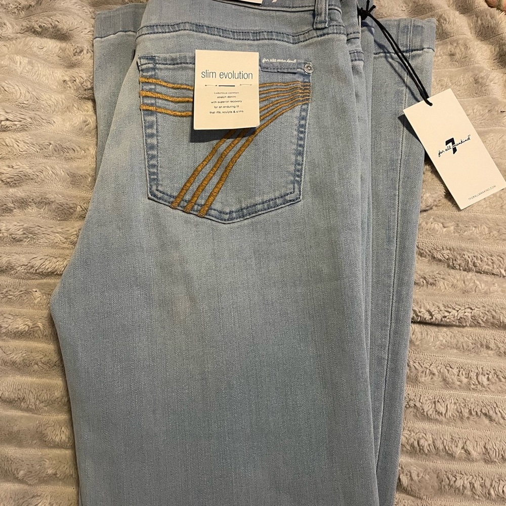 7 For All Mankind Light Blue Flare Jeans with Gold Stitching